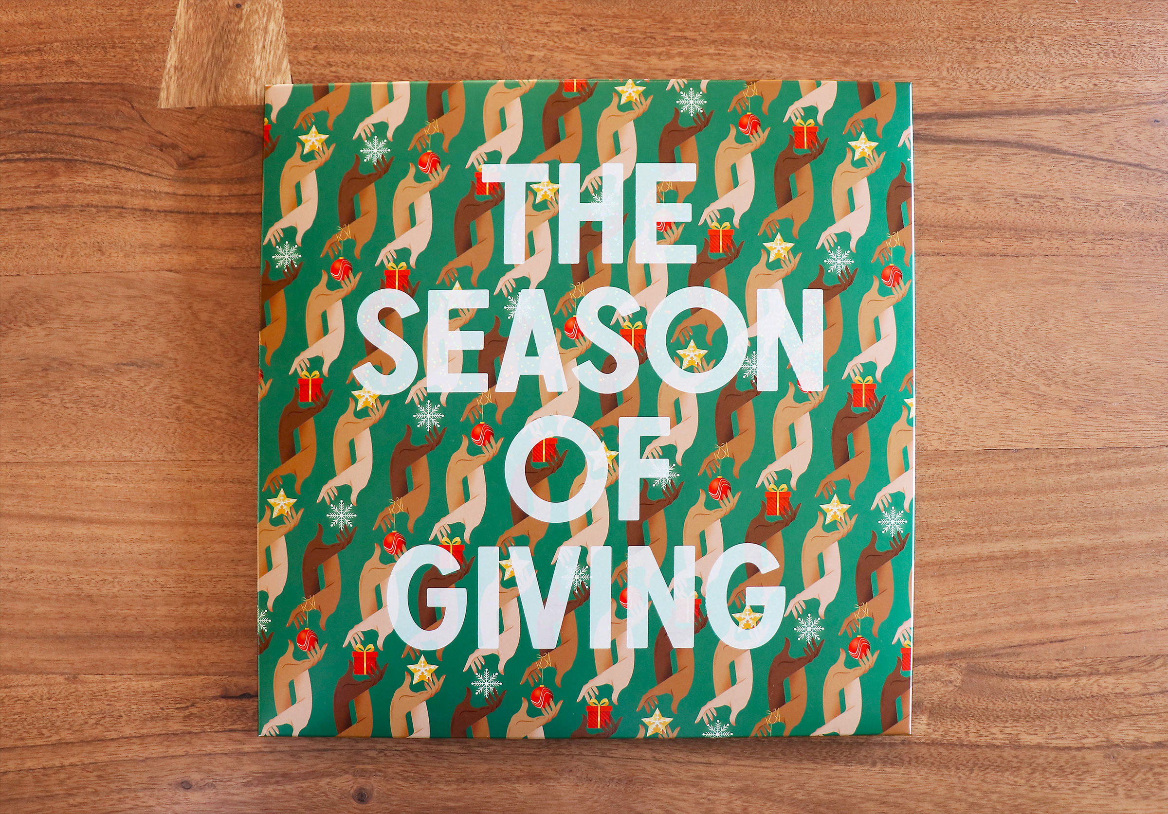Front cover artwork of the Season of Giving Holiday Wrap set