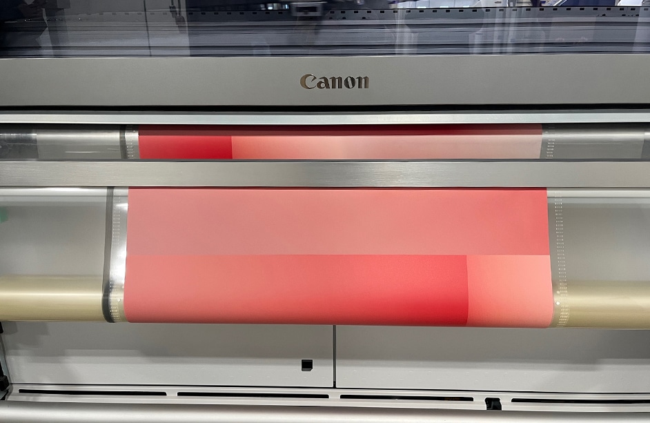 Front view of the Canon Colorado M5 with roll-to-roll material being printed