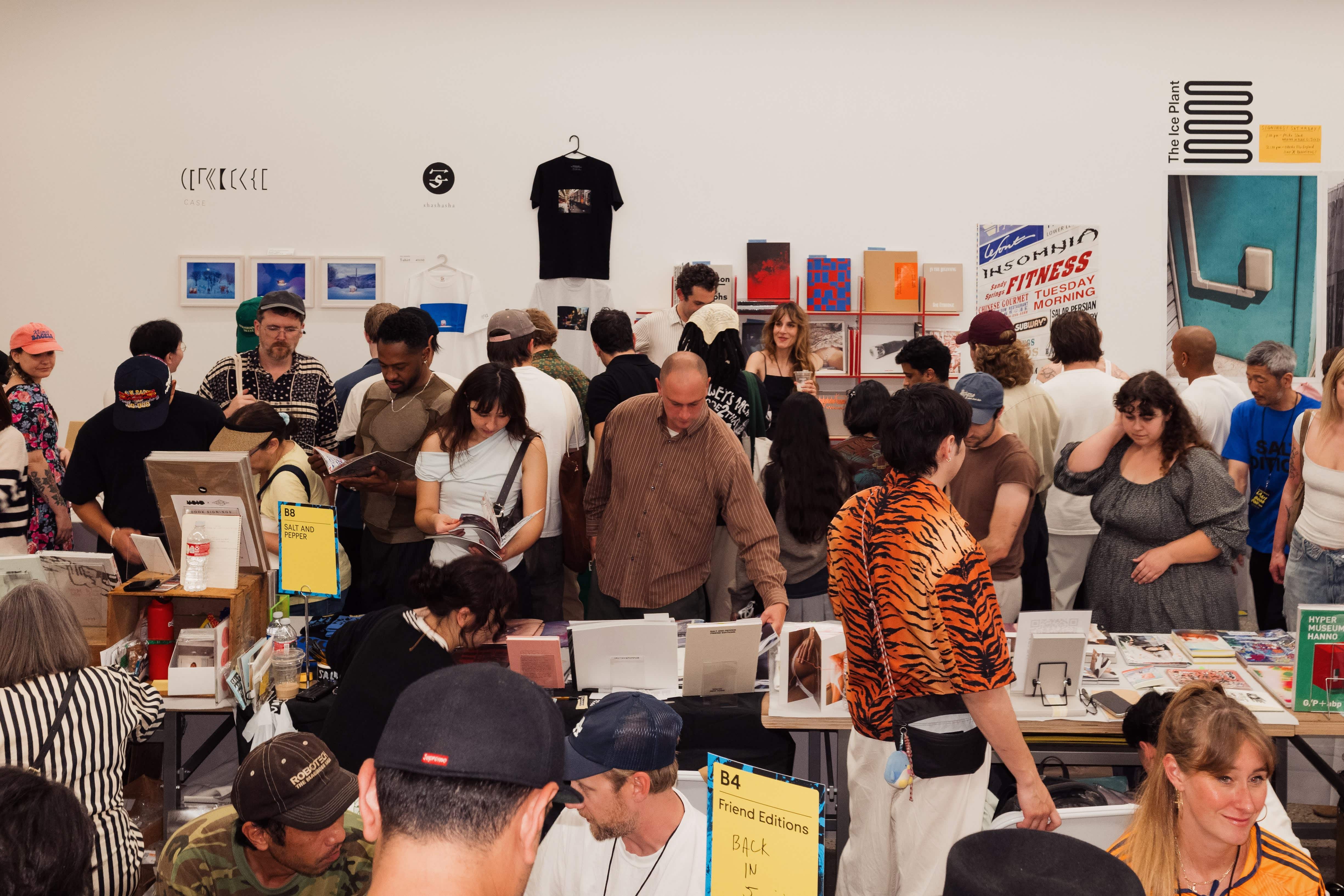 A crowd of people from the print design community attending LA Art Book Fair